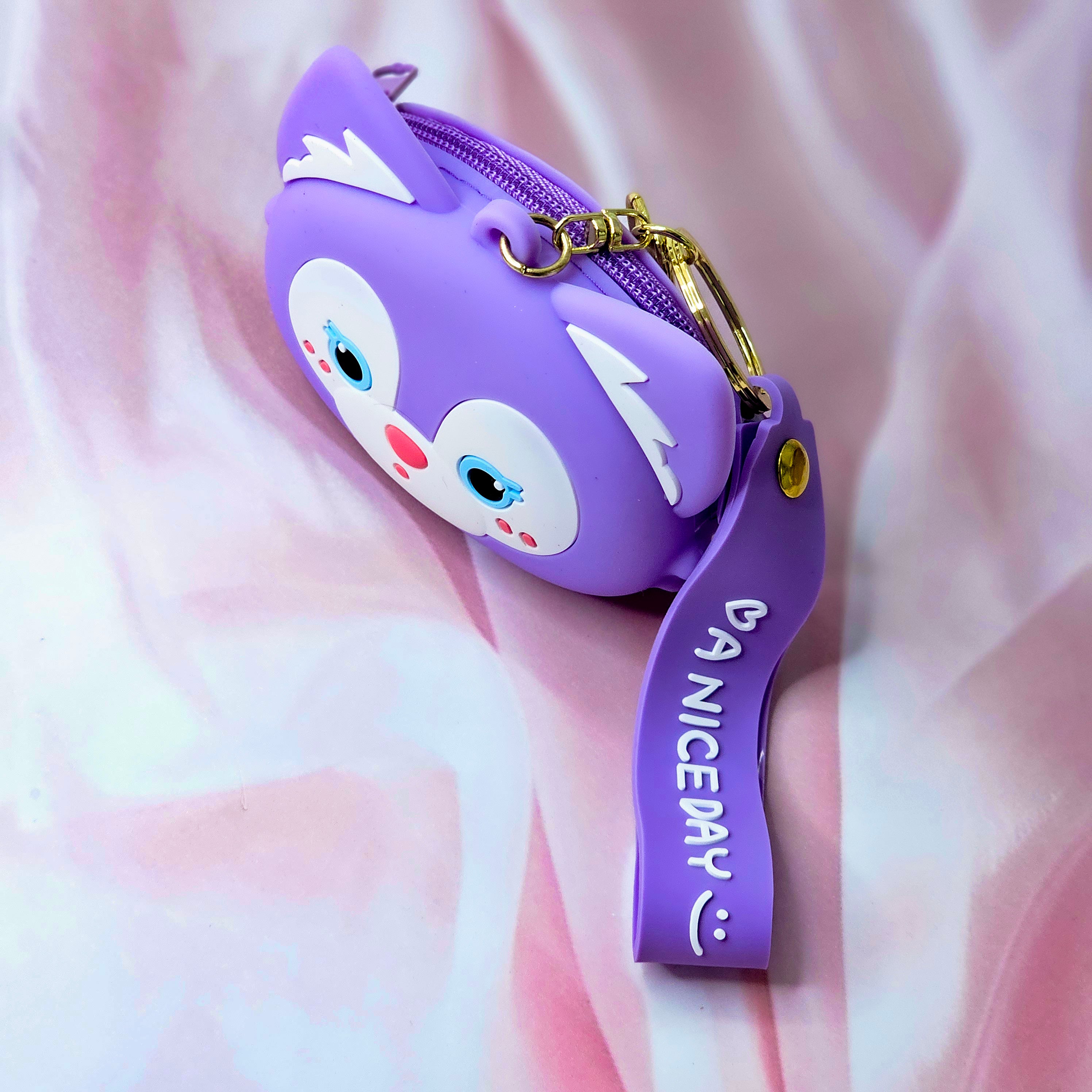 Durable silicone Tom character coin purse and keychain, a unique accessory for kids' bags or keys, combining style and utility. www.usmille.com